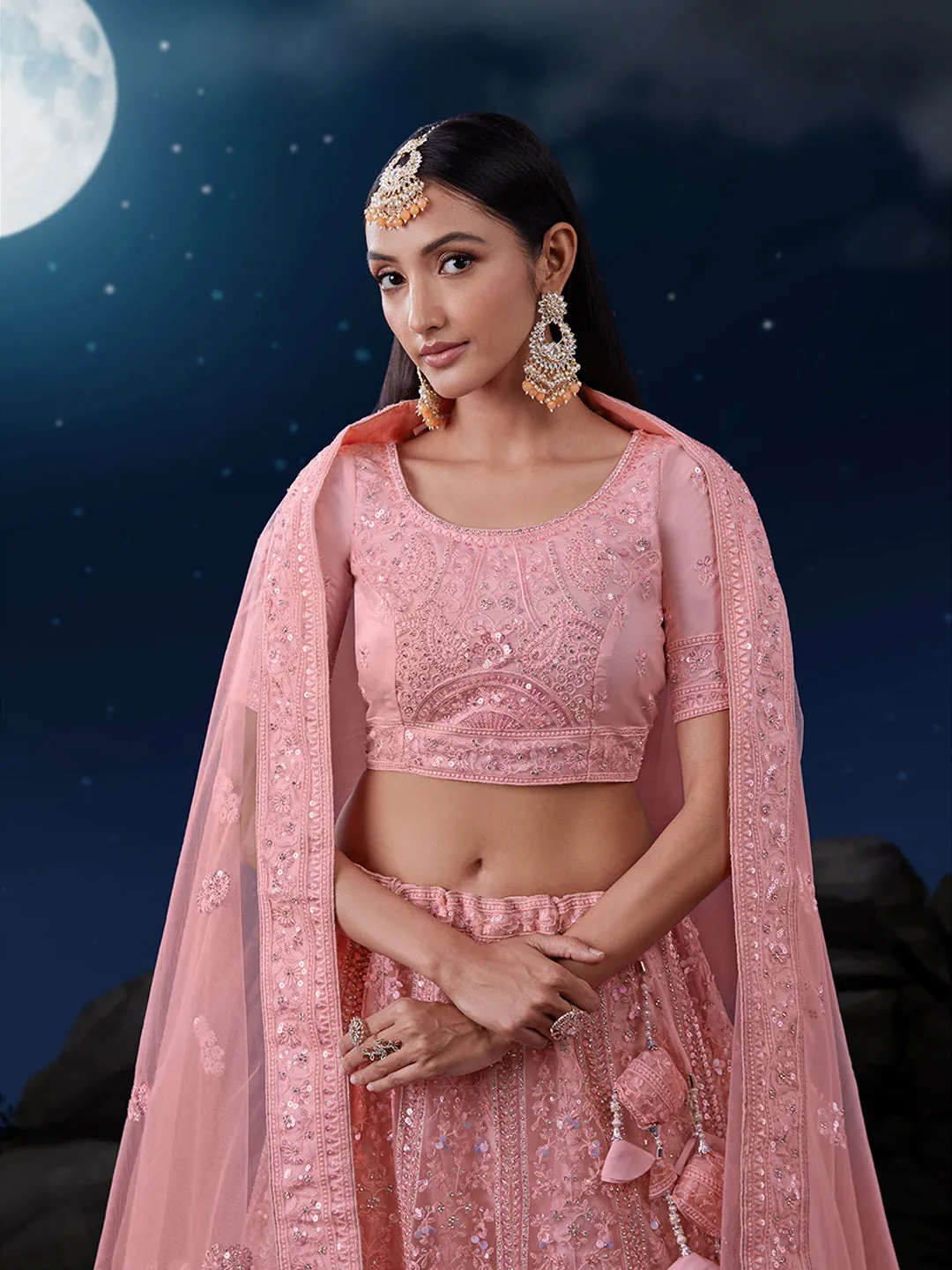 Exquisite Pink Lehenga Set with Shimmering Embellishments